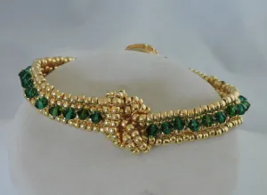 Bracelet with Swarovski Emerald Bicones and Gold Beads